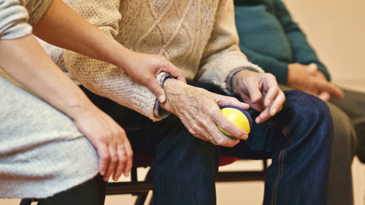 holding and elders hand for comfort